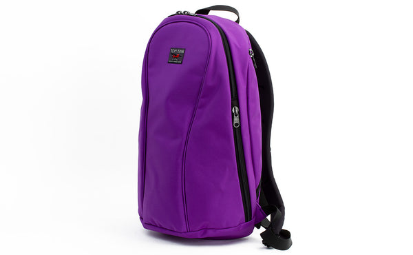 A profile shot of the Luminary 15 in Alphaviolet (bright purple) 525 Ballistic.